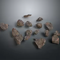 Natural Brown Stones Scattered On Dark Background With Rough Textured Surfaces