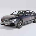 Dark Blue Luxury Sedan Side View With Sleek Body And Large Alloy Wheels