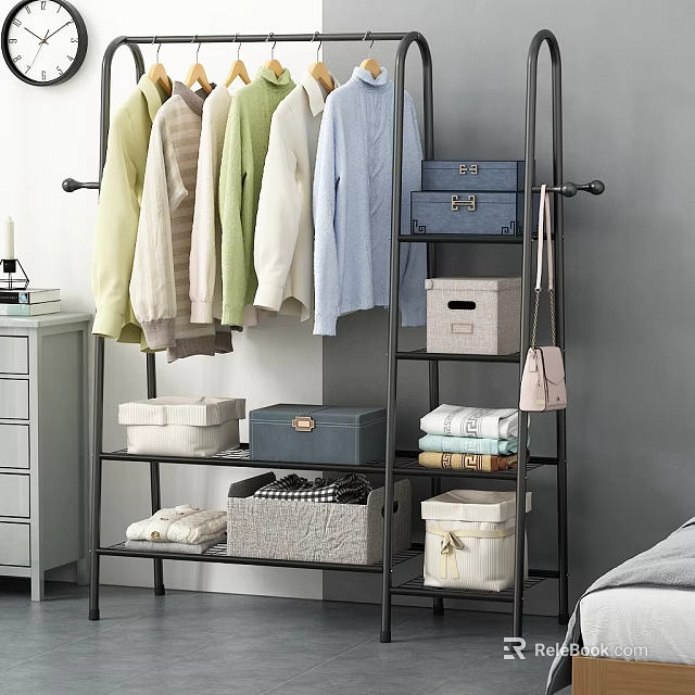 Organized Clothes Hanging On Metal Rack With Storage Boxes Baskets And Folded Items 3d model