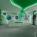 Cultural Art Exhibition Hall With Green Wall Orange Pipe Decor Circular Installations And White Counter