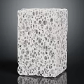 White Porous Cube Structure Featuring Intricate Hole Patterns On Surface 3d model