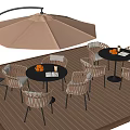 Outdoor Table Dining Set With Rattan Chairs And Beige Umbrella On Wooden Deck