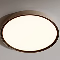 Modern Round Ceiling Light With White Shade And Dark Frame For Home Illumination