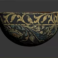 Intricately Carved Bowl With Golden Floral Patterns And Rich Red Interior