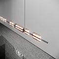 Modern Interior Design With Stylish Linear Pendant Light Hanging Above Dining Table