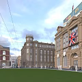 Historic Commercial Street Featuring Classic Buildings Union Jack Flag Green Lawn And Pedestrians