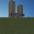 Two Modern Tall Glass Curtain Office Buildings Against Clear Blue Sky