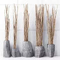 Natural Garden Decor With Dried Branches In Gray Stone Vases Against White Wall