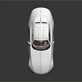 Silver Modern Sports Car With Sleek Aerodynamic Design And Smooth Reflective Finish