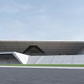 Modern Museum Building With Geometric Sloped Roof And Glass Facade In Grass Field