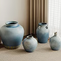 Blue Ceramic Vessels Of Various Sizes In Interior Corner With Curtains Blinds And Carpeted Floor