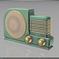 Vintage Turquoise Electronic Radio With Circular Speaker Gold Knobs And Classic Grill Design