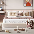 Cozy Double Bed In Modern Bedroom With Plush Pillows Stuffed Toys Toy Train And Desk