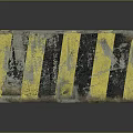 Worn Concrete Road Barrier Block With Yellow And Black Stripes And Scratches