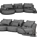 Cozy Modular Sofa In Green And Beige With Pillows And Blankets