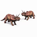 Two Realistic Brown Triceratops Toy Models With Horns Standing On White Background