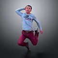 A Man Jumping In Grey Long Sleeve T Shirt With Lakers Logo And Red Pants