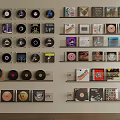 Vintage Vinyl Records Wall Display With Colorful Album Covers And Shelves