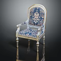 Elegant Ornate Chair With Blue Floral Upholstery And Gold Decorative Trim