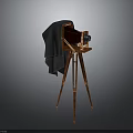 Vintage Electronic Camera Design With Wooden Tripod And Cloth Cover