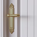 Elegant Golden Decorative Door Handle On White Wooden Door With Classical Design Details