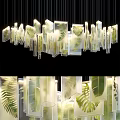 Modern Transparent Glass Chandelier With Leaf Pattern And Illuminated Hanging Design