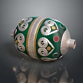 Green And Silver Decorative Container With Ornate Curved Patterns And Colorful Dots