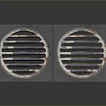 Two Round Metal Grilles With Striped Design On Dark Background