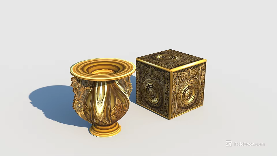 Golden Decorative Vase And Cube With Intricate Carved Ornamental Patterns 3d model 