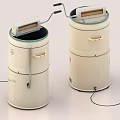 Vintage Cylindrical Washing Machines Featuring Retro Metal Handles And Classic Design