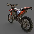Orange and Black Motocross Motorcycle With Large Off Road Tires And White Seat