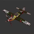 Space Themed Green Model Aircraft With Checkered Wings And Colorful Nose
