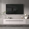 Modern White TV Stand With Flat Screen TV Green Plant And Decorative Items