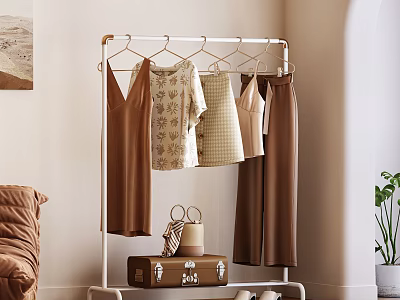 Brown Casual Clothes Of Different Styles Hanging On Metal Clothes Rack 3d model