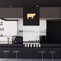 Modern Black White Storefront with Golden Cow Logo Bar Counter and Coffee Machine