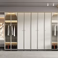 Modern Wardrobe Interior Design With Glass Doors Hanging Clothes And Integrated Lighting