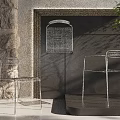 Modern Minimalist Metal Leisure Chair With Silver Frame And Mesh Design In Natural Light