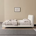 Modern White Double Bed with Upholstered Headboard in Beige Bedroom with Nightstand and Decorative Painting