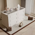 White Bathroom Vanity With Flower Vase Toiletries And Handbags On Polka Dot Rug