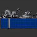 Blue Patterned Gift Box With White Ribbon Bow And Decorative Curls