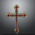 Intricate Golden Cross Sculpture With Red And Blue Decorative Carvings