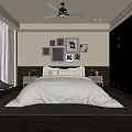 Modern Bedroom Interior With Large Bed Dark Quilt Decorative Paintings Ceiling Fan And Striped Carpet