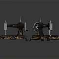 Two Vintage Sewing Machines With Decorative Floral Patterns And Classic Design