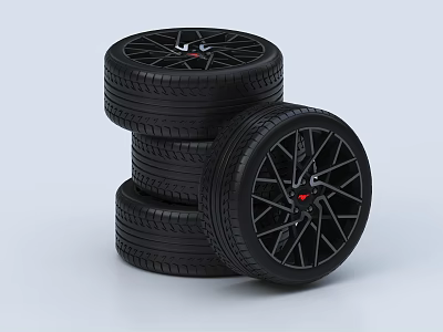 Black Car Tires Stacked With Stylish Wheels And Red Accents 3d model