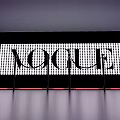 VOGUE Modern Exhibition Space With Illuminated Staircase And Blue Lighting Interior