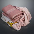 Colorful Soft Towels Stacked Folded And Draped In Pink White Yellow
