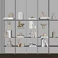 Modern Bookshelf Display With Decorative Ornaments Vases Books And Dried Plants