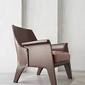 Modern Brown Leather Leisure Chair With Armrest And Light Colored Wall