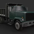 Green Heavy Duty Dump Truck Front View With Large Dump Bed And Metallic Body