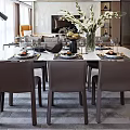 Modern Dining Living Room Interior With Crystal Chandelier Dining Table Chairs And Decorative Flowers